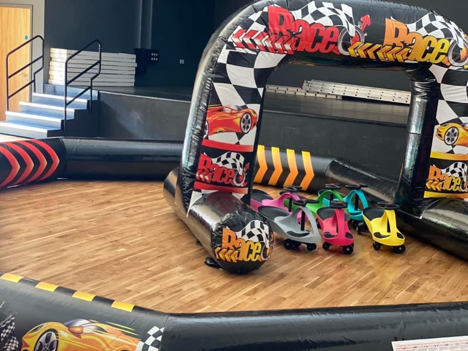Didi Car Race Track with 6 Didi Cars 15ft x 20ft Best Bouncy Castle Hire service in Aylesbury