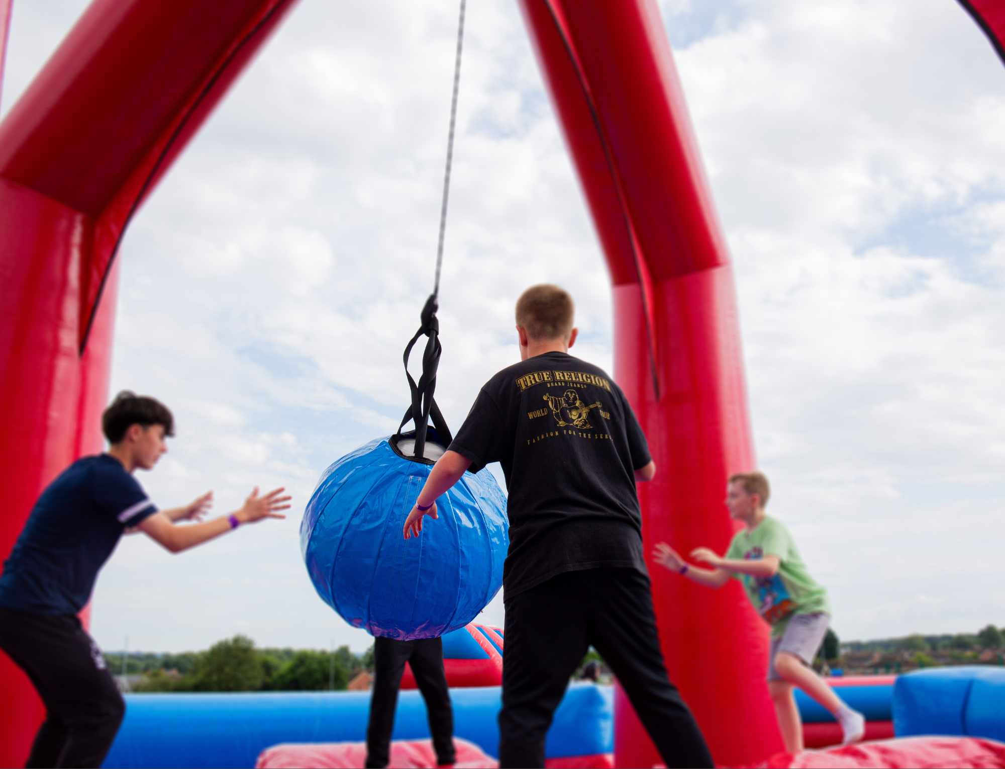 Corporate fun day entertainment with large inflatables and games