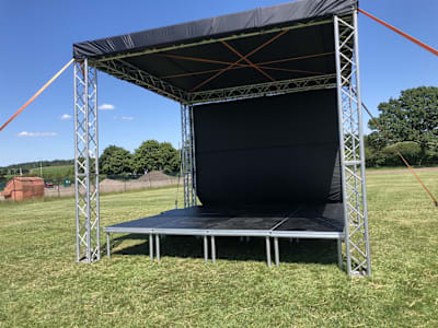 The stage the chairs face