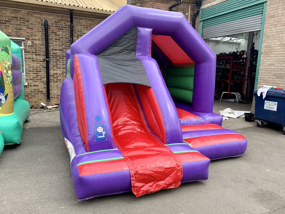 Multi Coloured Themed Bouncy Castle Slide Combo 12ft W X 15ft L North East Bouncy Castle Inflatable Hire Dj Disco Hire In Hartlepool Middlesbrough Darlington Durham Stockton On Tees Sunderland