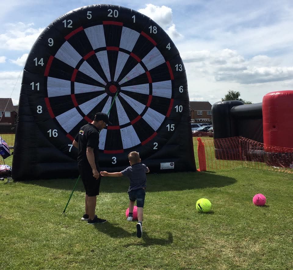 Large Inflatable Dart Board Bouncy Castle and Soft Play Hire