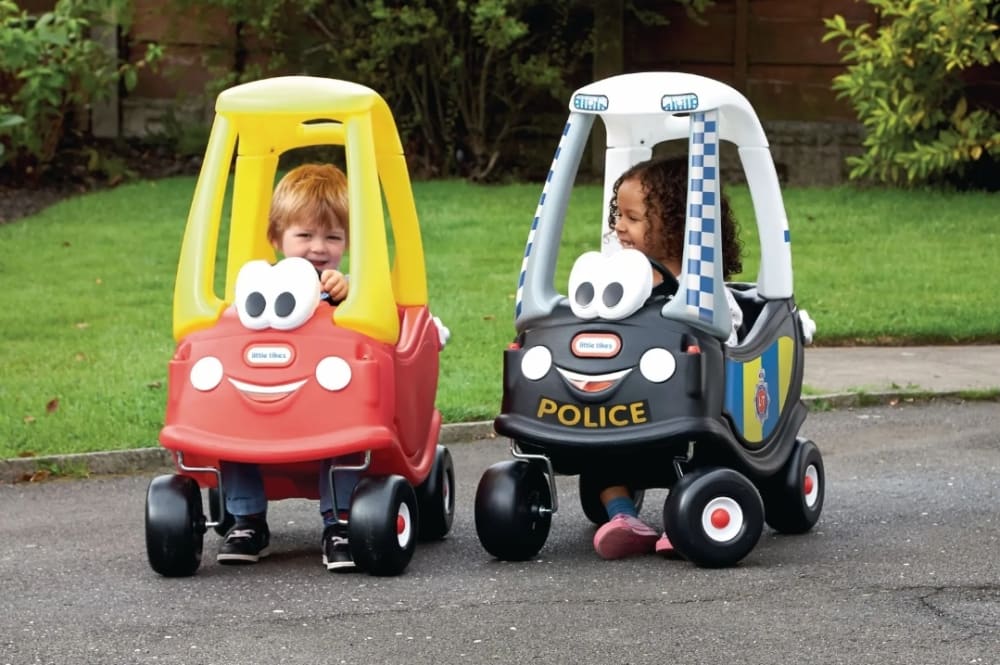 Cozy Coupe Police Ride on Cars. Bouncy Castle Hire in London Bouncing Bonkers