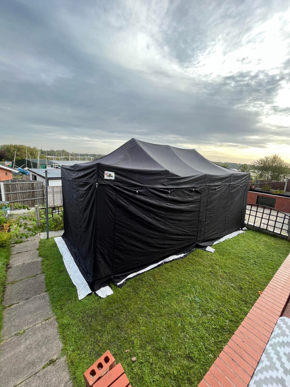 Inflatable gazebo outlet with sides