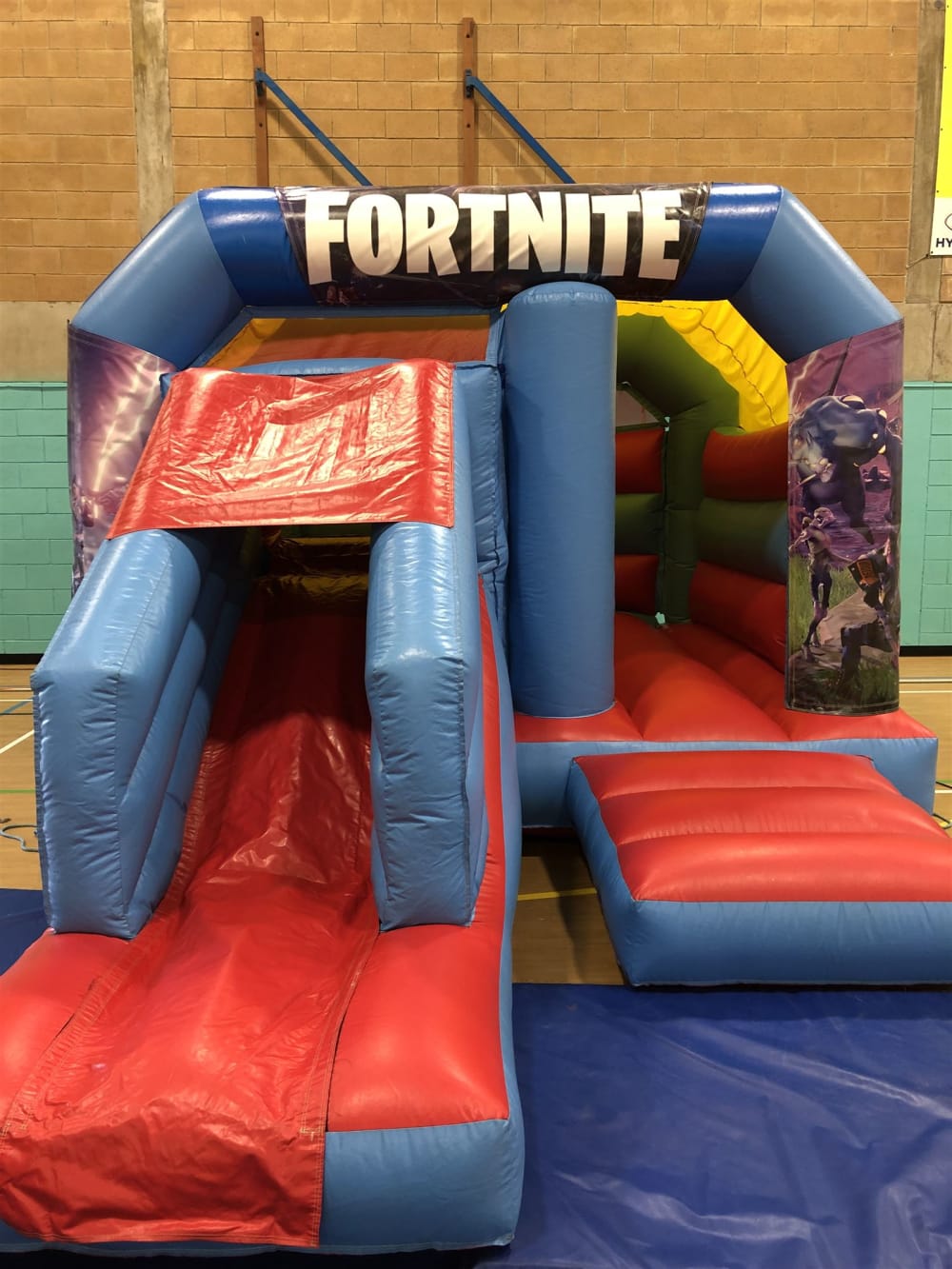 why choose colossal events - fortnite bouncy castle london