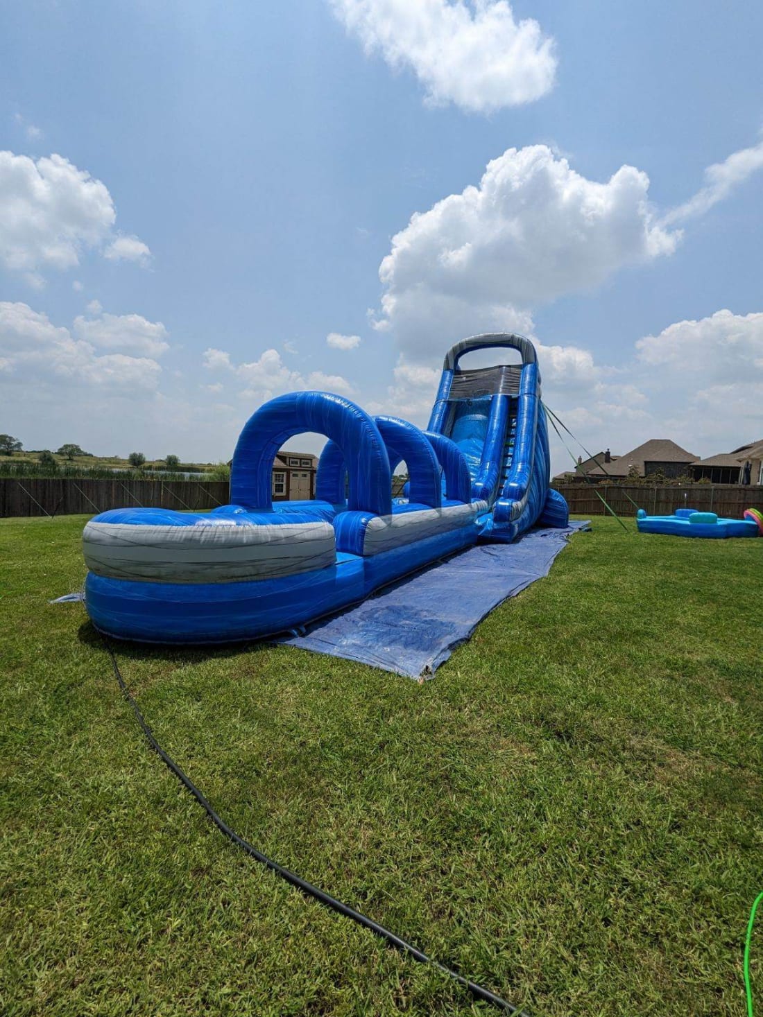 24ft Tall Mega Blue Rush Waterslide W/ Slip n Slide - Hire in TX