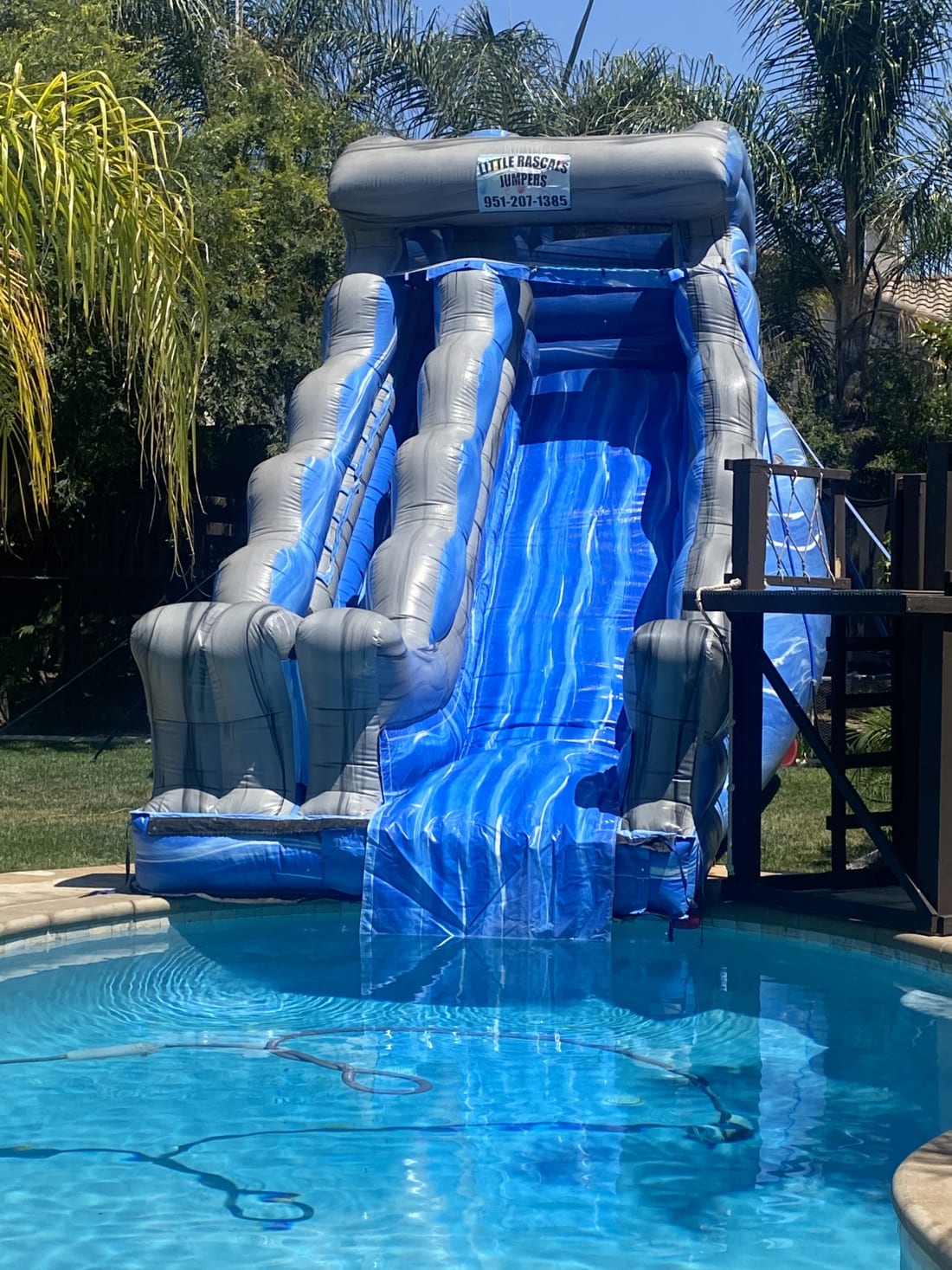 Inflatable water hot sale slide into pool