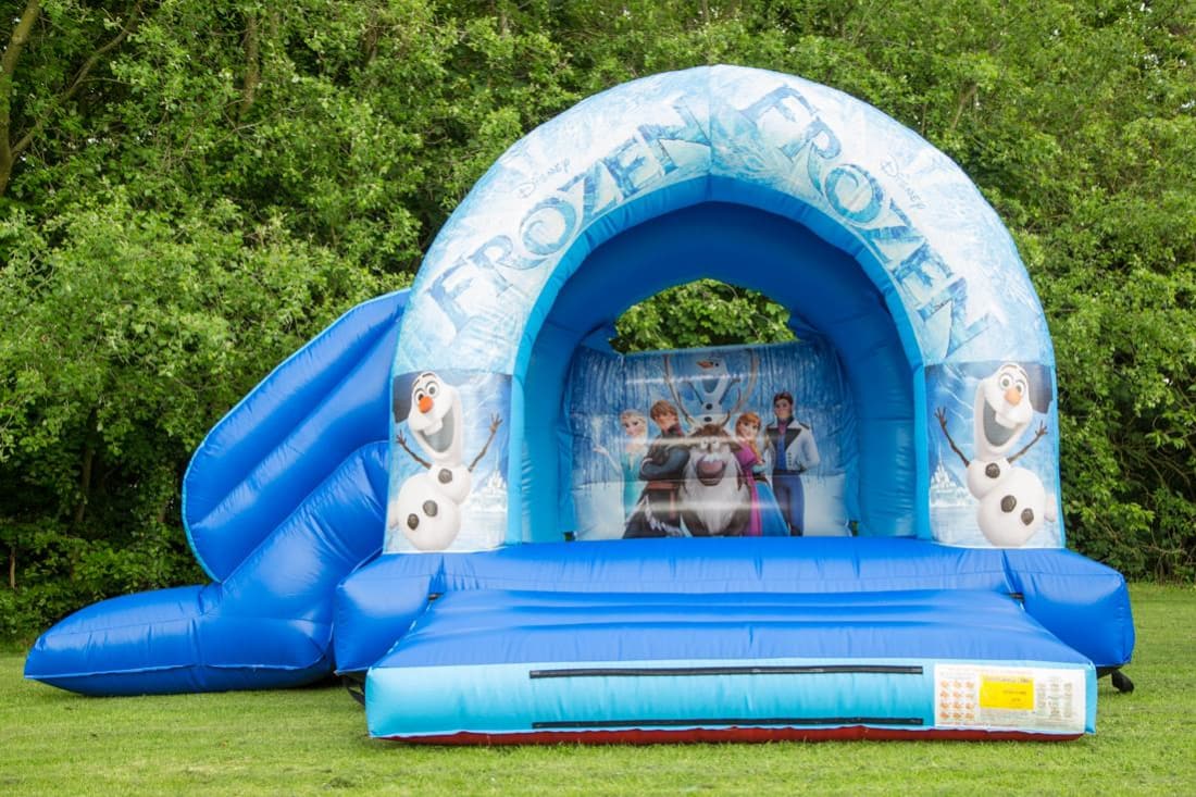 Frozen bouncy castle with sales slide