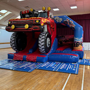 3D XL Monster Truck Twin Slide Bouncy Castle Hire in Leeds
