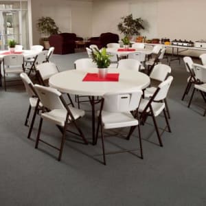 (4) 60" Round tables and 32 chairs