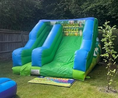 Inflatable Toddler Slide 9ft High Jungle themed, a inflatable slide for hire from 1st Choice Inflatables