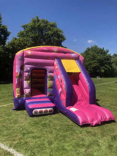 12ft x 18ft Princess Bounce House Slide Combo, a bounce and slide combo for hire from Rick's Castles