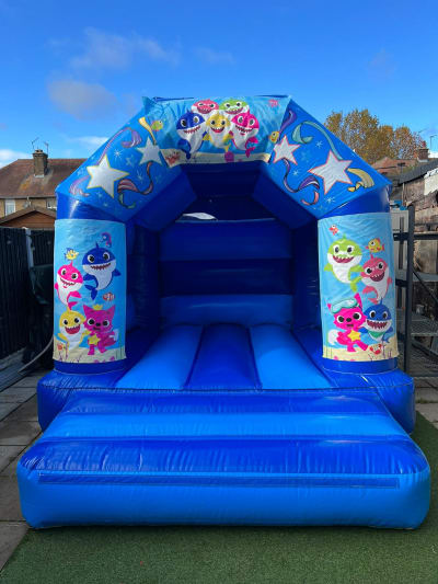 Baby Shark, a toddler inflatable for hire from Bouncy Castle Club