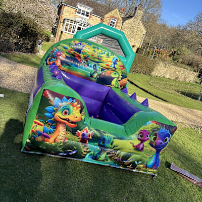 Baby Dino High Back Inflatable Ball Pool, a soft play set for hire from Bouncing Happy