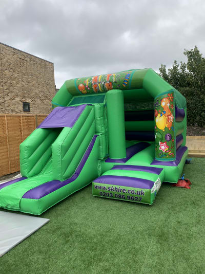 12' x 18 ft' Carnival Bounce, Jump and Slide Castle, a bounce and slide combo for hire from SK Hire Events