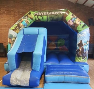 18ft x 12ft Minecraft Bouncy Castle Front Slide, a bounce and slide combo for hire from Bouncy Castle Factory