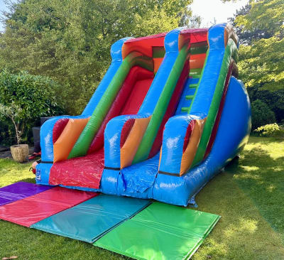 5 - Rainbow Inflatable Slide, a inflatable slide for hire from BJ's Bouncy Castles & Soft Play Hire