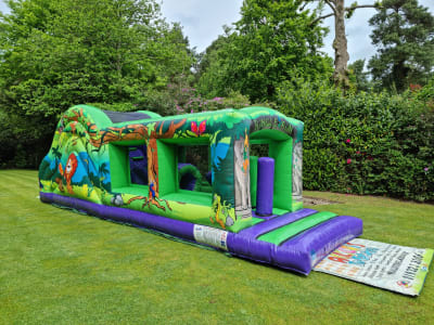 Jungle Run Obstacle Course Hire Surrey, a assault course for hire from Allsorts Inflatables