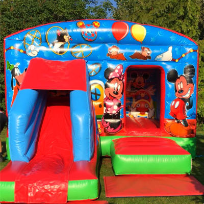 Bounce & Slide Mickey & Minnie Deluxe, a bounce and slide combo for hire from Bromley Bouncy Castles