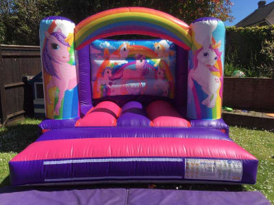 Unicorn Toddler Bouncy Castle, a toddler inflatable for hire from Cookes Castles