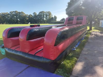 Bungee Run, a assault course for hire from Wallington Bouncy Castles