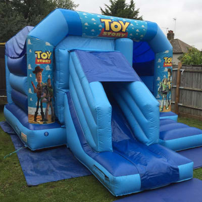 Toy Story Combo, a bouncy castle for hire from Bounce About Sussex