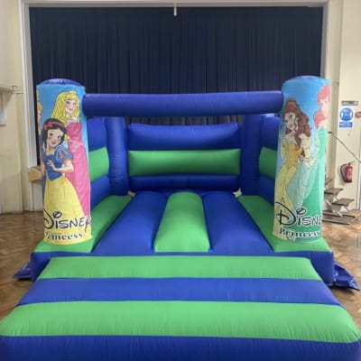 Disney Princess Bouncy Castle (15x11ft Low Height), a bouncy castle for hire from The Bounce Generation
