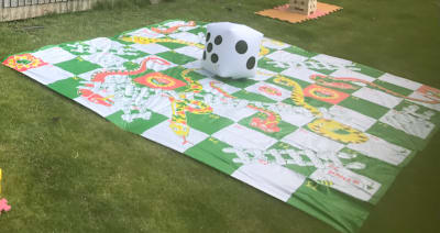 Giant Snakes & Ladders Game, a inflatable game for hire from Bounce N Fun