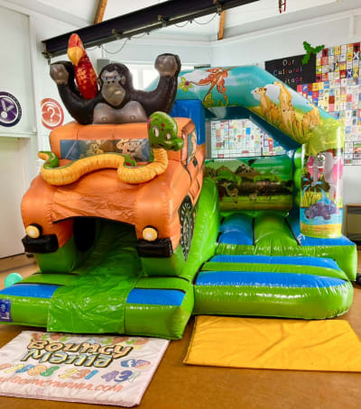 Safari Bounce N Slide, a bounce and slide combo for hire from Bouncy Mania