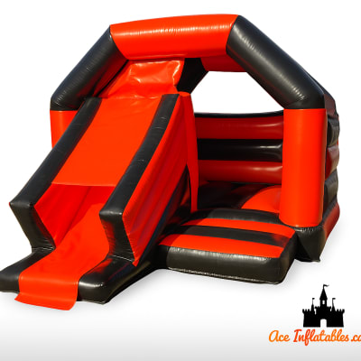 Black and Orange Bounce & Slide 17ft x 13ft, a bounce and slide combo for hire from Ace Inflatables