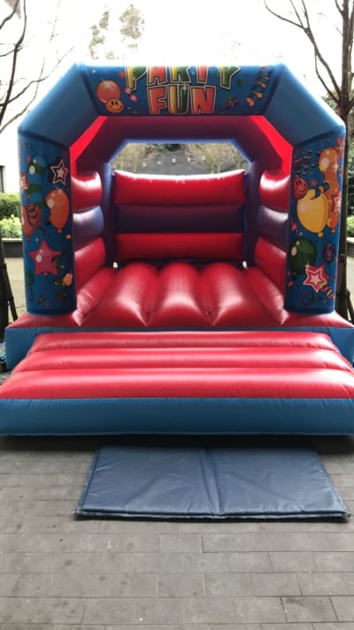 11 x 15ft Party Fun Bouncy Castle, a bouncy castle for hire from SK Hire Events