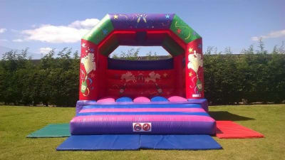 Champagne Theme Adult castle, a adult bouncy castle for hire from Bouncy Castles Surrey