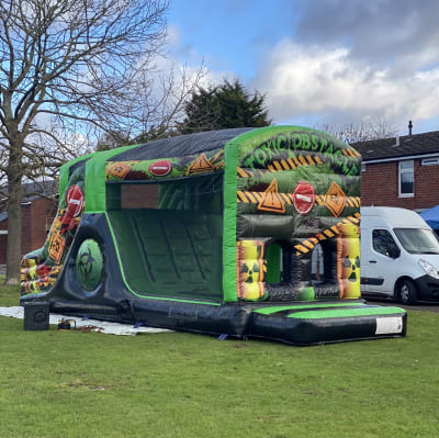28ft x 9.5ft Toxic Fun Run, a assault course for hire from Wizard Bouncy Castles