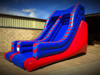 Blue and Red Inflatable Slide (10ft), a inflatable slide for hire from Cookes Castles