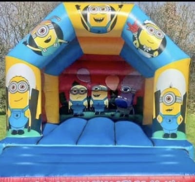 Minions Bouncy Castle, a bouncy castle for hire from Happy Days Bouncy Castles