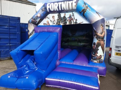 12 by 17ft fortnight castle and slide - fortnite bouncy castle manchester