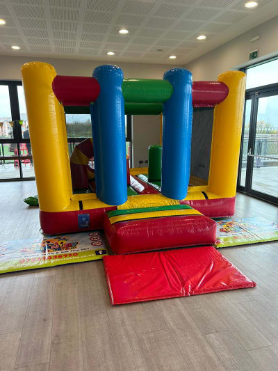 Multicolour Midi Bouncer, a bouncy castle for hire from Jump N Joy Inflatables