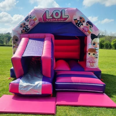 18ft x 12ft LOL Bouncy Castle With A Front Slide, a bounce and slide combo for hire from Bouncy Castle Factory