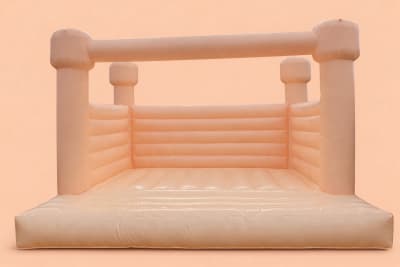 Peach pastel bouncy castle, a bouncy castle for hire from Croydon Bouncy Castles