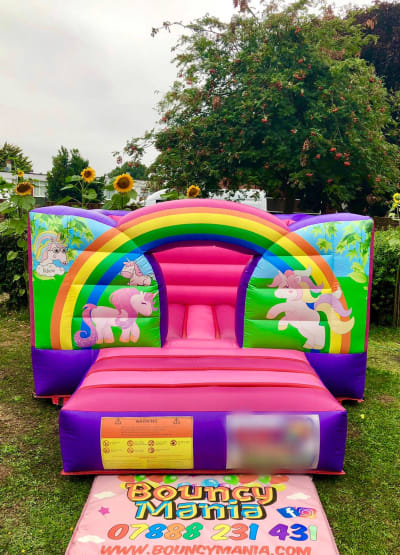 Low Height Unicorn Castle, a bouncy castle for hire from Bouncy Mania