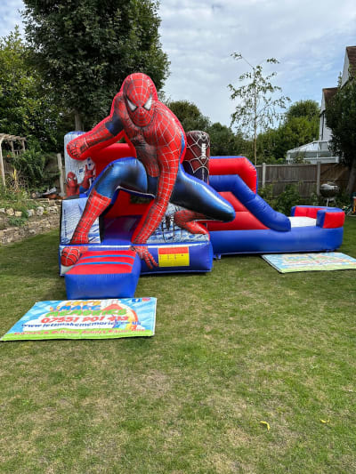 Spider Man Midi Bounce & Slide, a bounce and slide combo for hire from Let's Make Memories