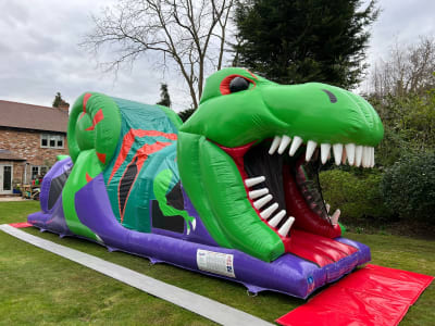 Dino Fun Run (10ft x 34ft), a assault course for hire from Elmbridge Inflatables