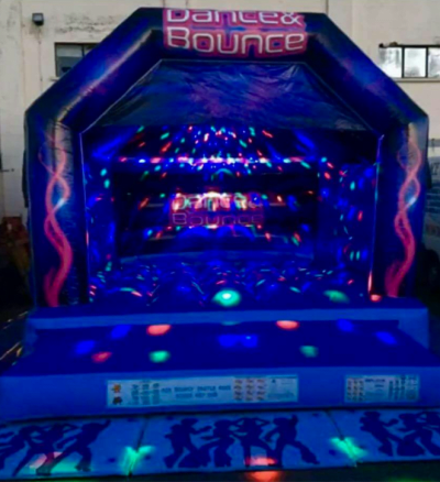 12x12ft Disco Themed Bouncy Castle, a bouncy castle for hire from Betchley's Bouncy Castles