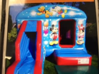 Mickey Mouse and Club House Friends Castle, a bouncy castle for hire from Happy Days Bouncy Castles