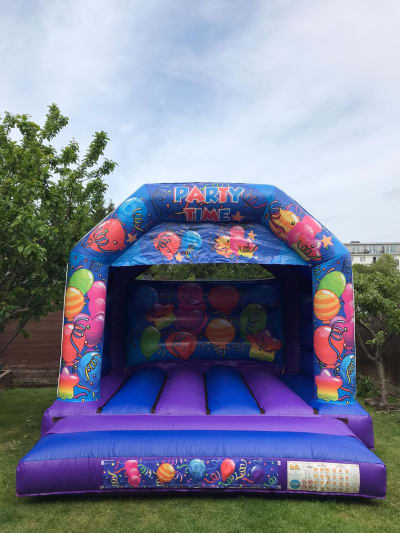 Blue Party Time Castle, a bouncy castle for hire from Chloe's Castles