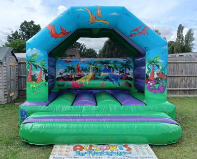 Dinosaurs Deluxe Bouncy Castle, a bouncy castle for hire from Allsorts Inflatables