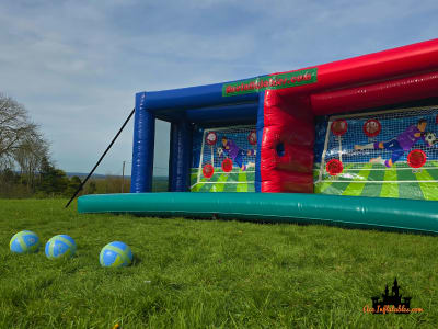 Football Double Shootout / Bungee Beat the Goalie 10x23ft, a inflatable game for hire from Ace Inflatables