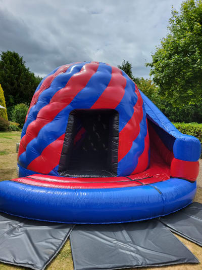 Red & Blue Disco Dome With Slide, a disco dome for hire from Kendall's Castles