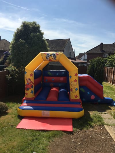 Cars Bouncy Castle With Slide (15ft x 17ft), a bounce and slide combo for hire from The Bounce Generation