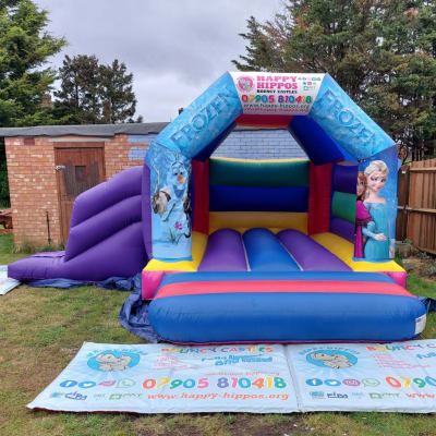 Frozen Slide 15ft x 18ft - Purple & Red, a inflatable slide for hire from Happy Hippos Bouncy Castles