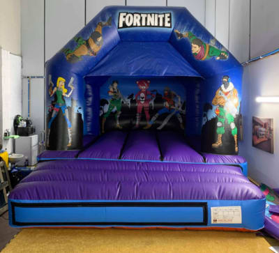 Fortnite Bouncy Castle (12 x 14), a bouncy castle for hire from Cookes Castles